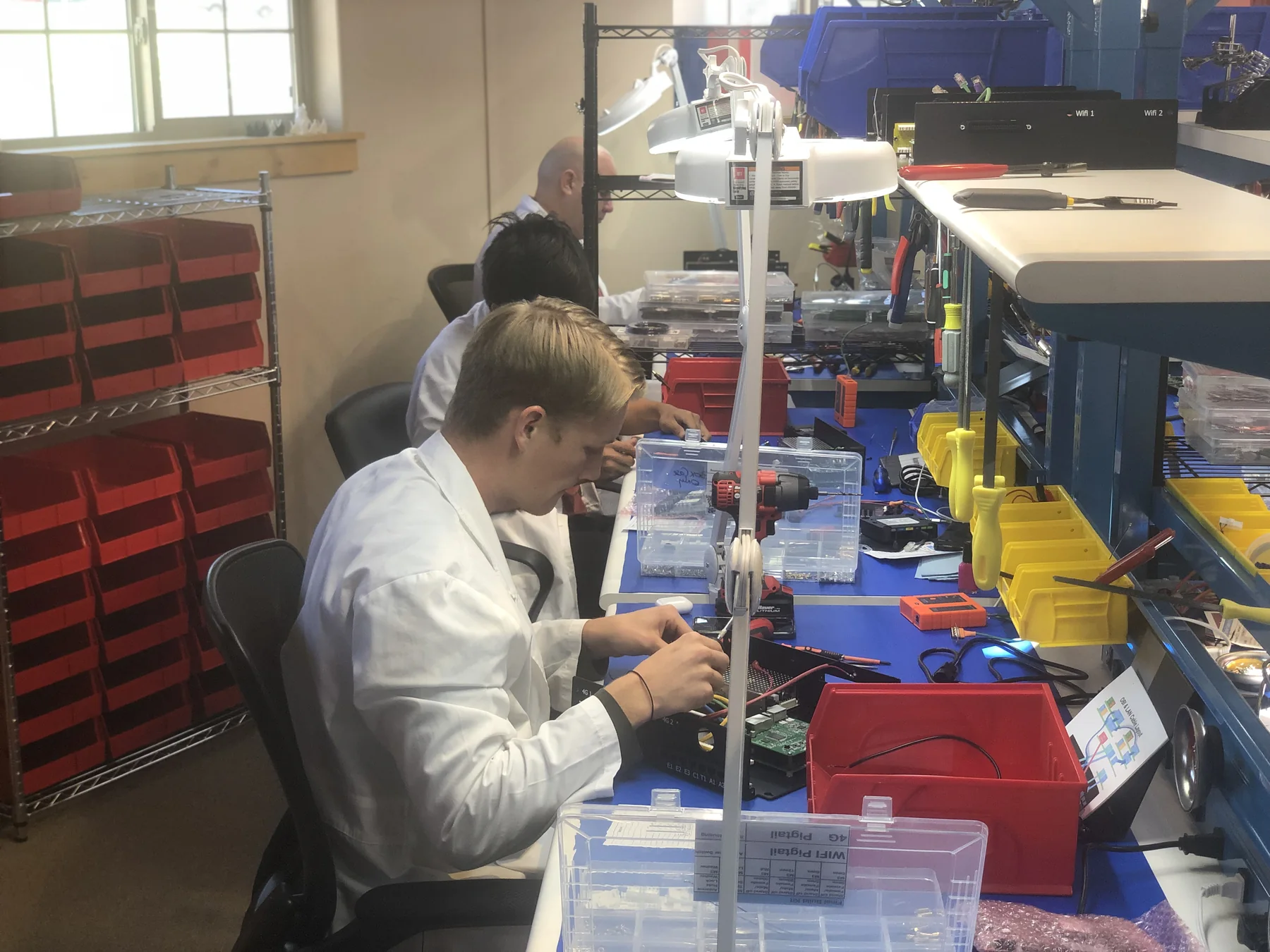 Swann Technologies lab equipment and electronics inspection workspace